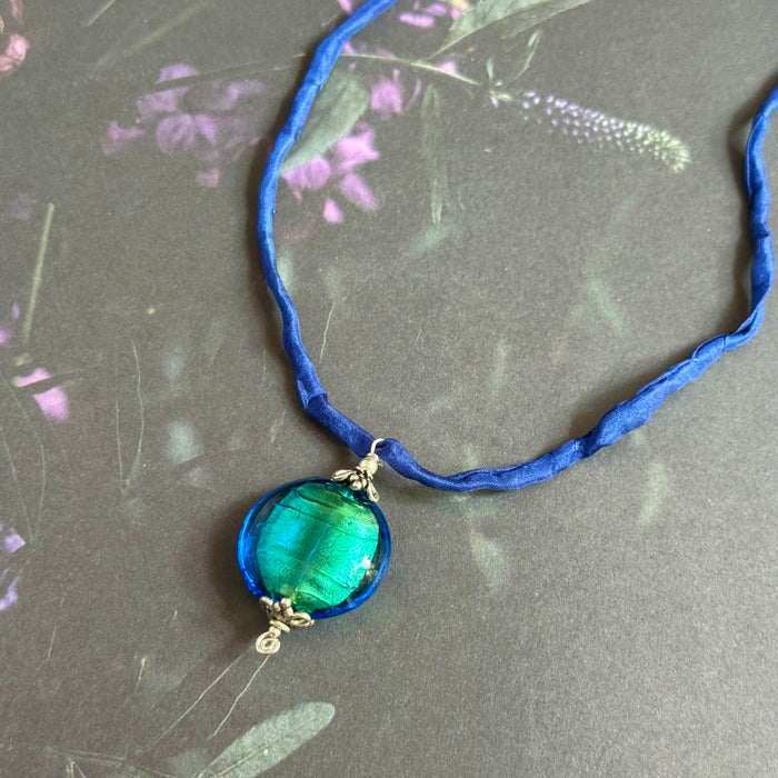 Vintage Venetian Foil Teal Necklace on Navy Blue Silk Cord