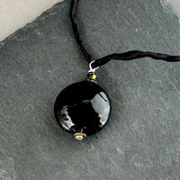 Murano Glass Black Disc Shape on Silk Cord in Sterling Silver