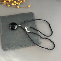 Murano Glass Black Disc Shape on Silk Cord in Sterling Silver