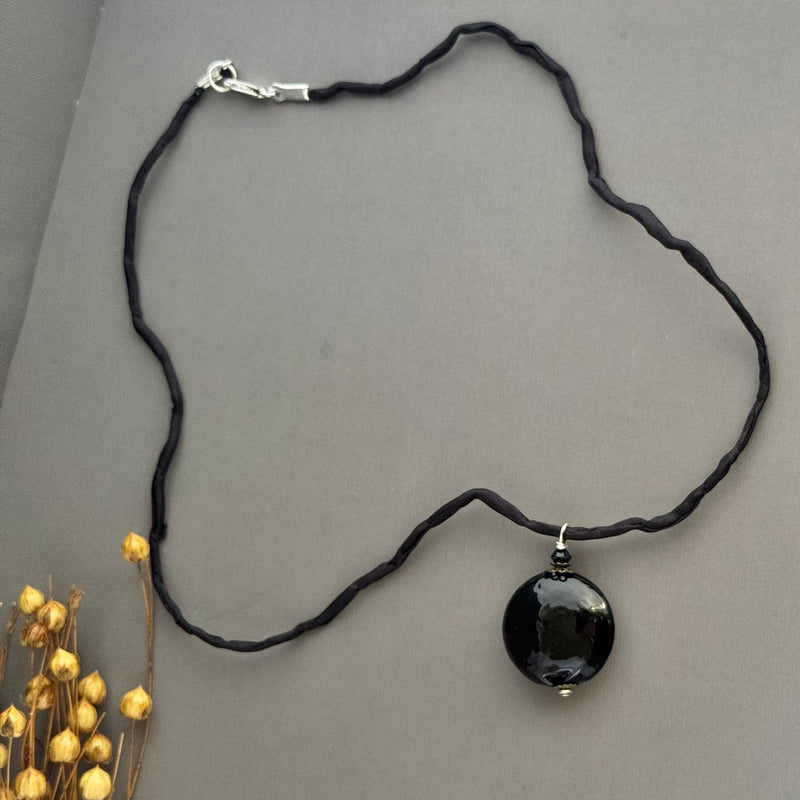 Murano Glass Black Disc Shape on Silk Cord in Sterling Silver