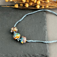 Handmade Grace Ma Blue and Gold Swirl Lamp Work Bead Necklace
