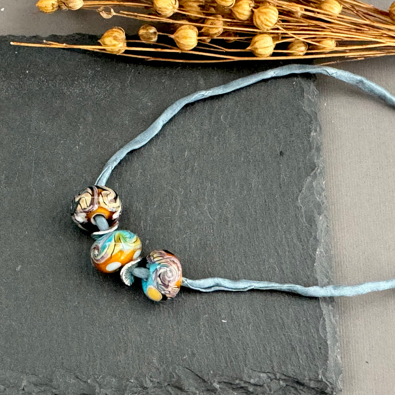 Handmade Grace Ma Blue and Gold Swirl Lamp Work Bead Necklace