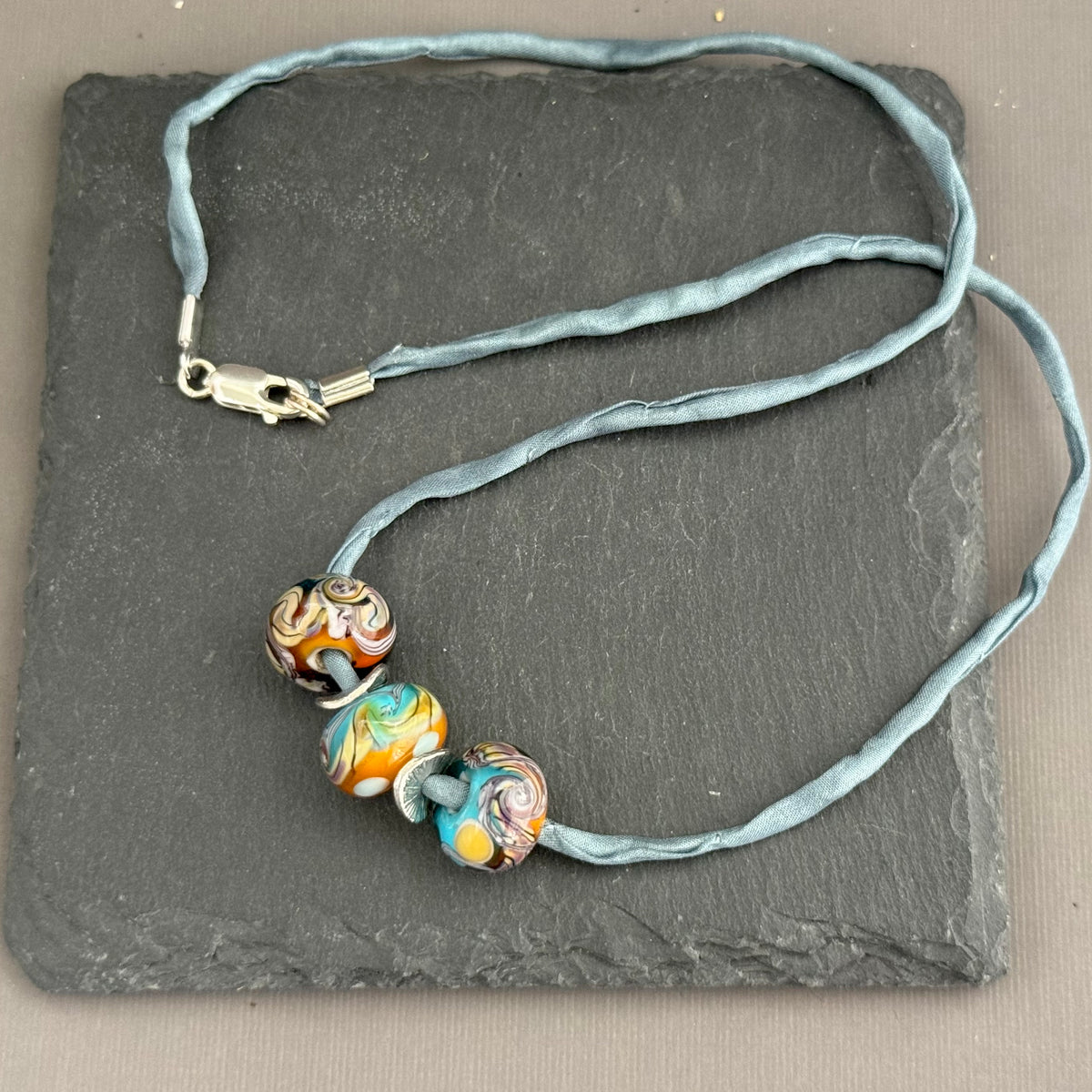 Handmade Grace Ma Blue and Gold Swirl Lamp Work Bead Necklace