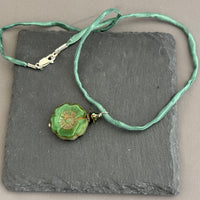 Czech Glass Green Hibiscus Flower Pendant Necklace in Sterling Silver