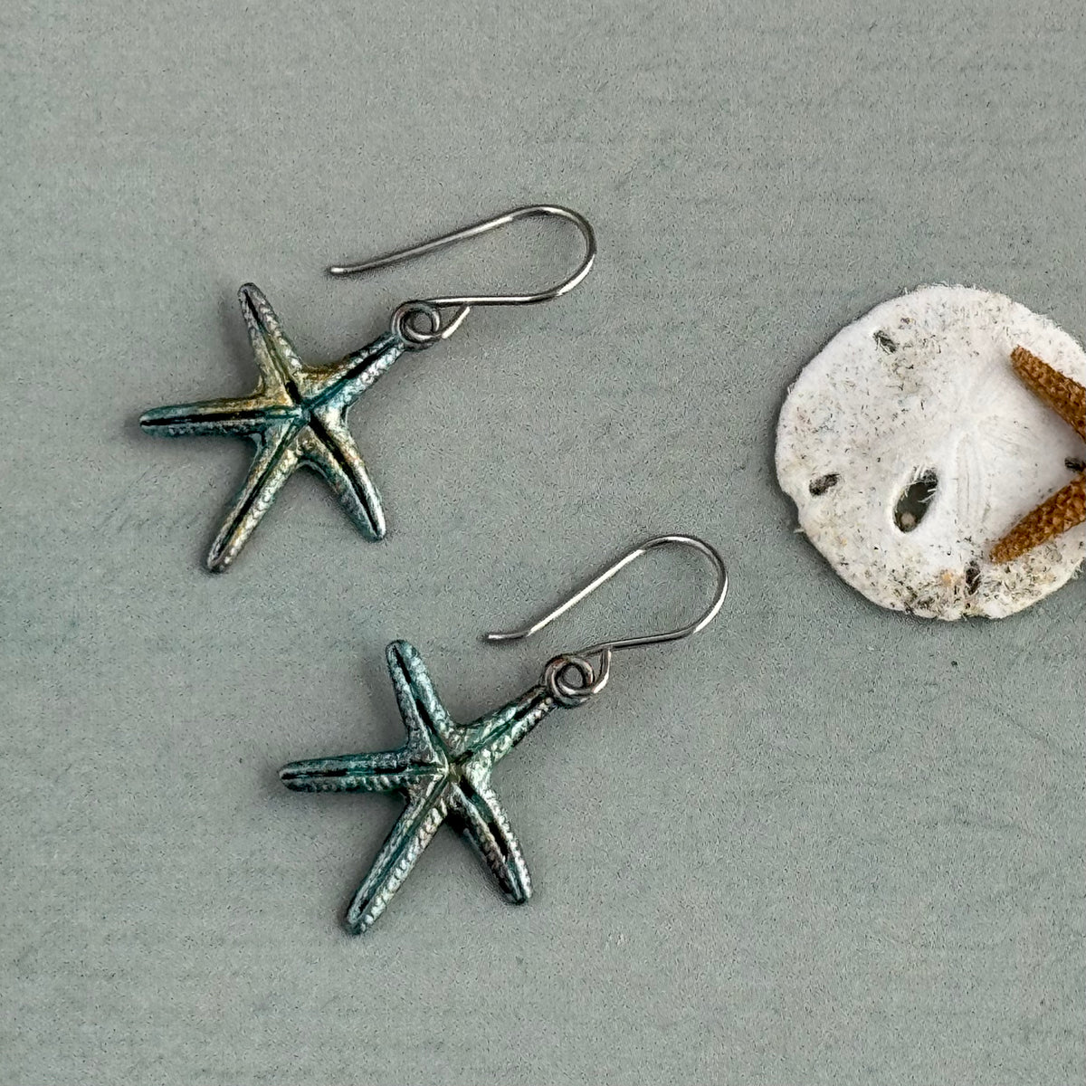 Beachy Brass Starfish Earrings in Sterling Silver