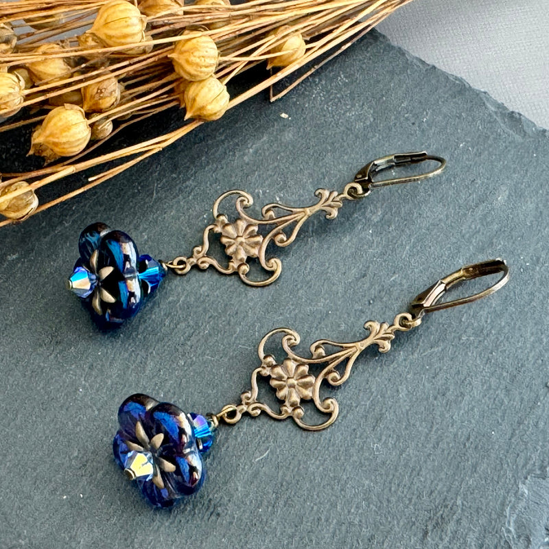 Czech Purple/Blue Glass Flat Bell Flower Earrings in Antique Brass
