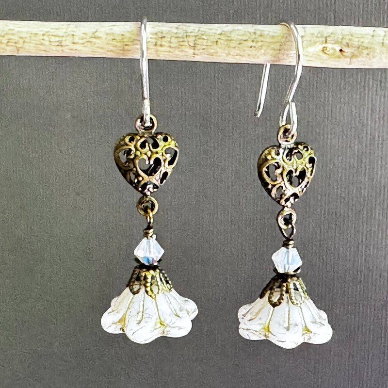 White Czech Glass Bell Flower Earrings with Antique Brass Heart Components in Sterling Silver