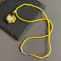 Dark Yellow Flower Pendant Necklace on Silk Cord in Sterling Silver