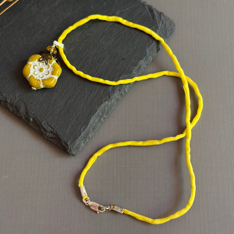 Dark Yellow Flower Pendant Necklace on Silk Cord in Sterling Silver