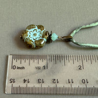 Clear Picasso and Blue Czech Glass Flower Pendant Necklace on Silk Cord in Antique Brass