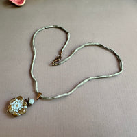 Clear Picasso and Blue Czech Glass Flower Pendant Necklace on Silk Cord in Antique Brass