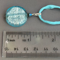 Murano Glass Large Pale Blue Coin Shape on Silk Cord