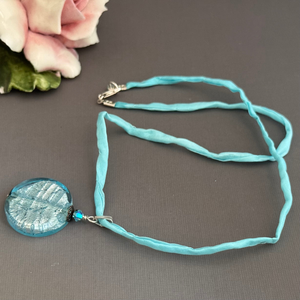 Murano Glass Large Pale Blue Coin Shape on Silk Cord