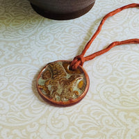 Handmade Orange Porcelain Fern Pendant on Silk Cord