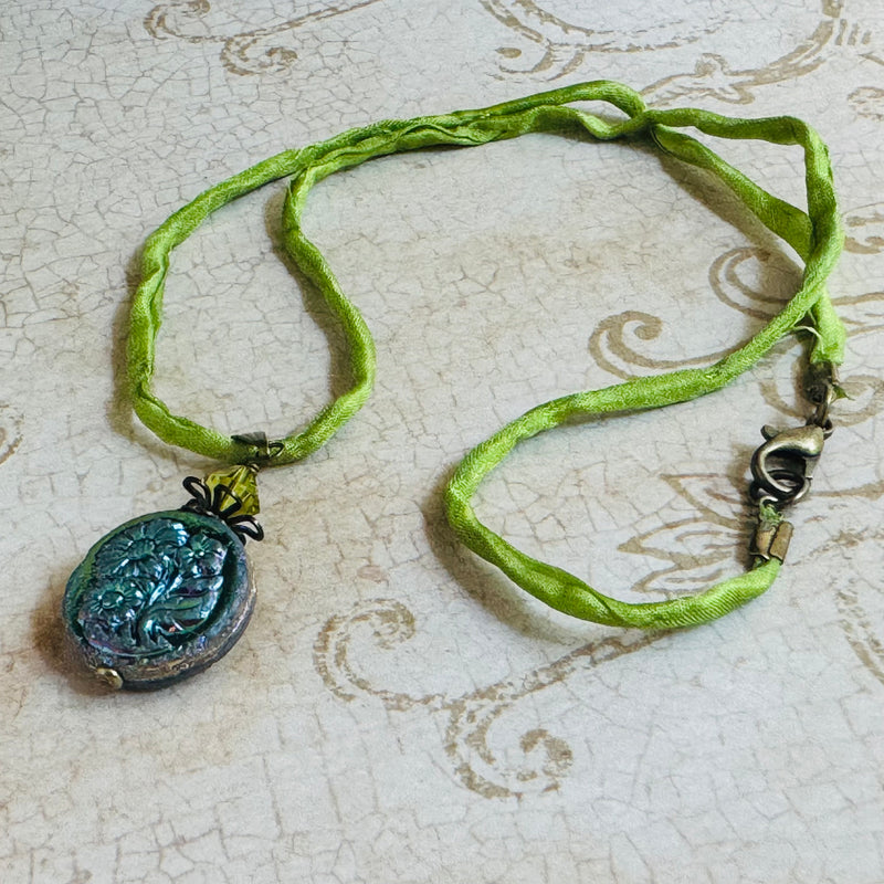 Metallic Green Czech Glass Flower Pendant on Silk Cord