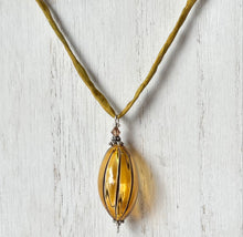 Load image into Gallery viewer, Light Orange and Black Murano Glass Pendant on Silk Cord
