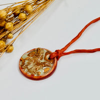 Handmade Orange Porcelain Fern Pendant on Silk Cord