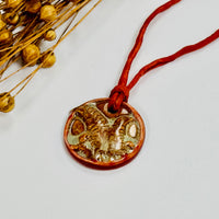 Handmade Orange Porcelain Fern Pendant on Silk Cord