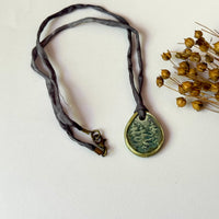 Handmade Porcelain Pine Tree Pendant on Hand Dyed Silk Cord
