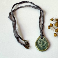 Handmade Porcelain Pine Tree Pendant on Hand Dyed Silk Cord