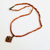 Orange Swarovski Crystal Filigree Pendant in Antique Brass