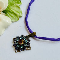 Amethyst and Sapphire Swarovski Crystal Filigree Pendant in Antique Brass
