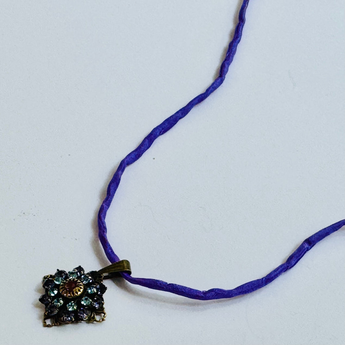 Amethyst and Sapphire Swarovski Crystal Filigree Pendant in Antique Brass