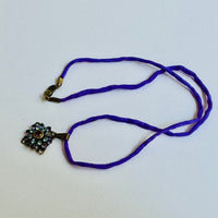 Amethyst and Sapphire Swarovski Crystal Filigree Pendant in Antique Brass