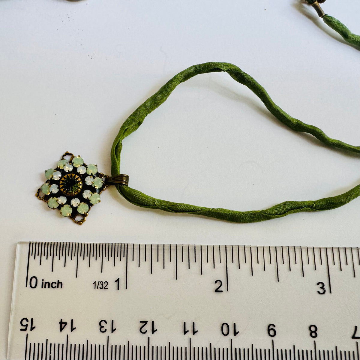 Light Green Swarovski Crystal Filigree Pendant in Antique Brass