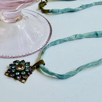 Amethyst and Sapphire Swarovski Crystal Filigree Pendant in Antique Brass