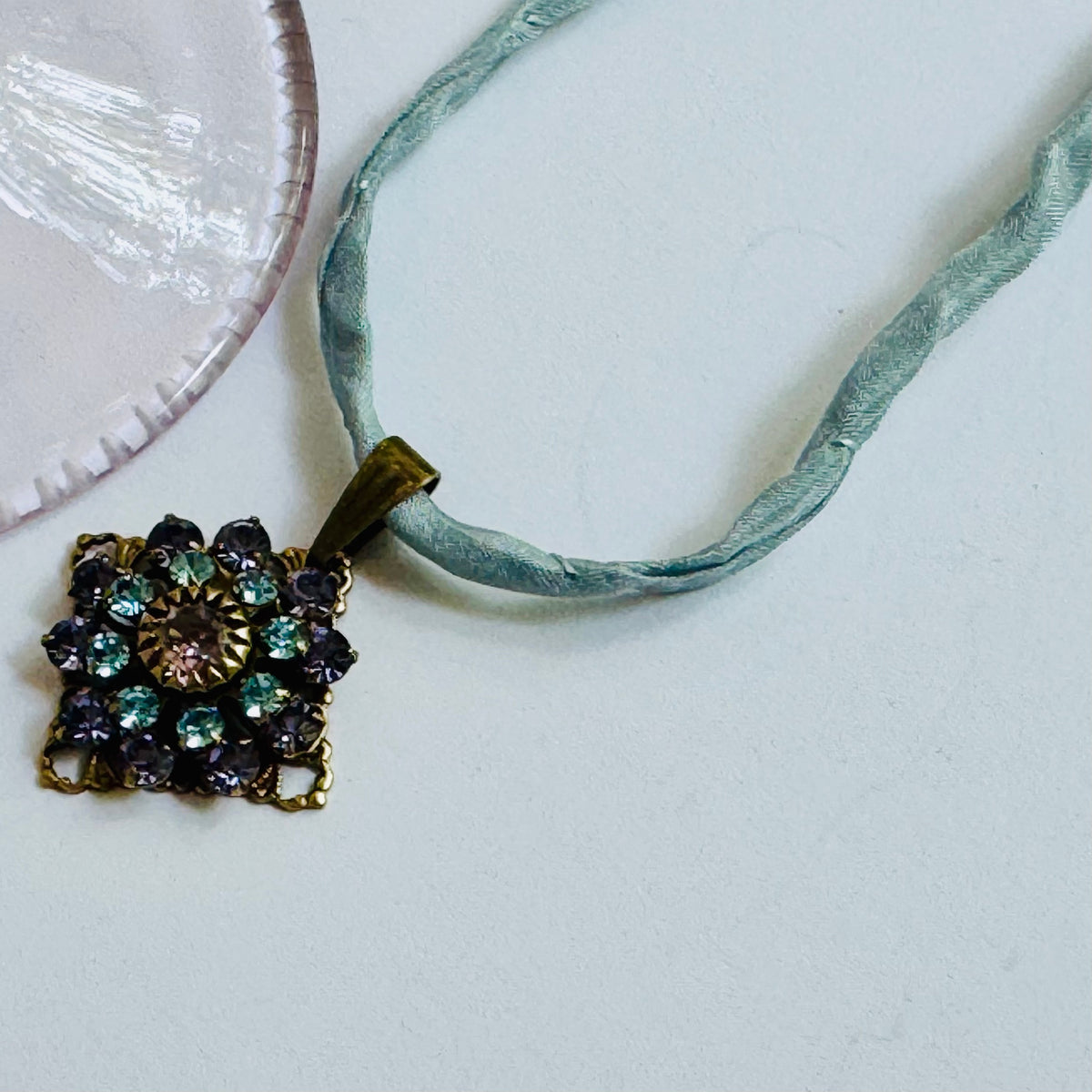 Amethyst and Sapphire Swarovski Crystal Filigree Pendant in Antique Brass