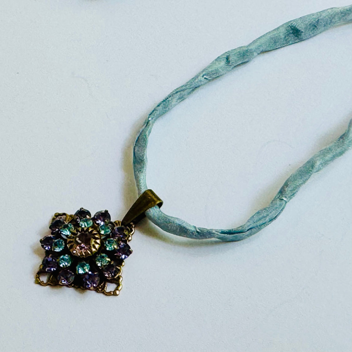 Amethyst and Sapphire Swarovski Crystal Filigree Pendant in Antique Brass