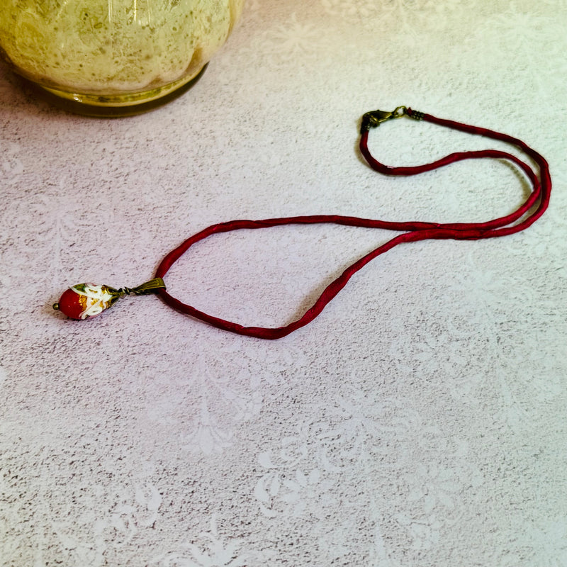 Red Oval Wedding Cake Necklace on Red Silk Cord