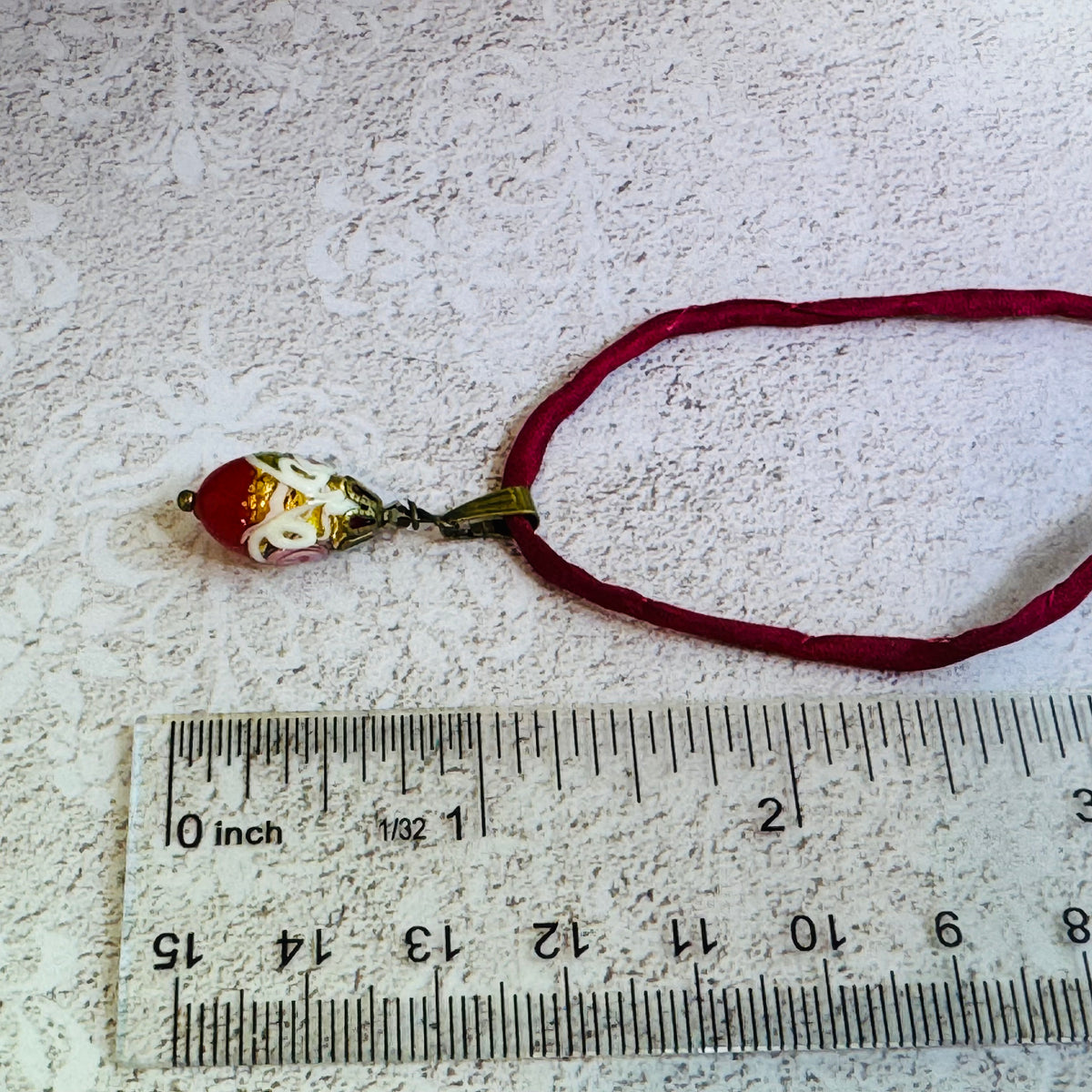 Red Oval Wedding Cake Necklace on Red Silk Cord