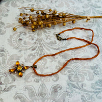 Gold Swarovski Crystal Starburst Pendant Necklace on Gold Silk Cord