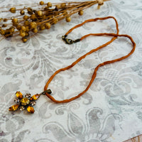 Gold Swarovski Crystal Starburst Pendant Necklace on Gold Silk Cord