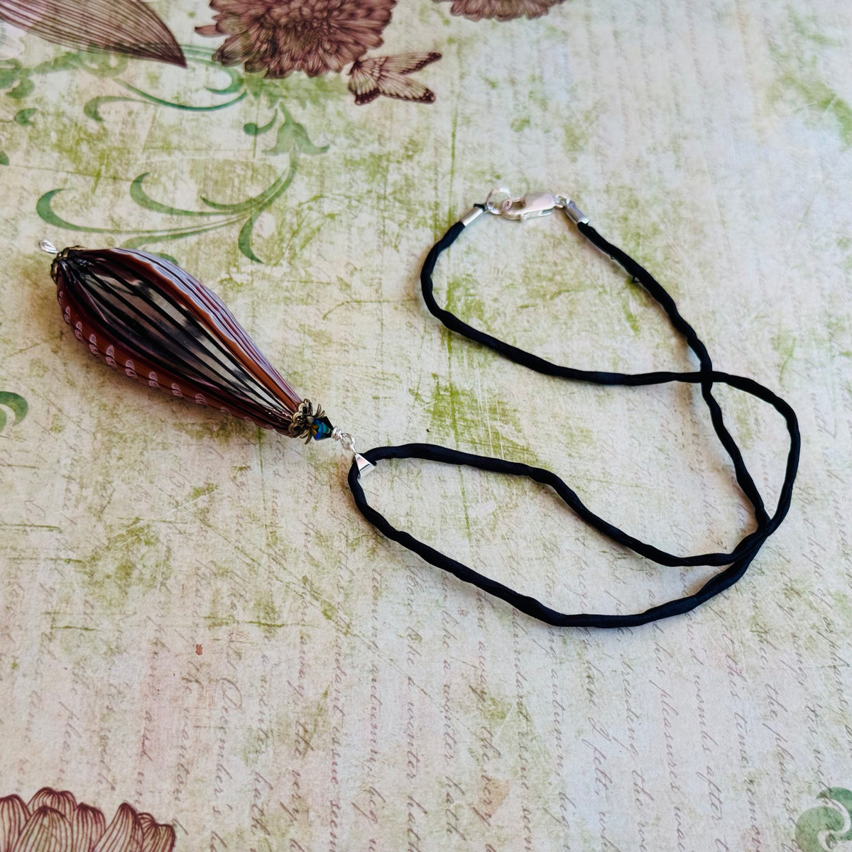 Black and Brown Murano Glass Sculpted Teardrop Bead on Silk Cord