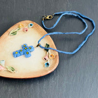 Light Blue and Yellow Murano Millefiori Glass Cross Pendant on Blue Silk