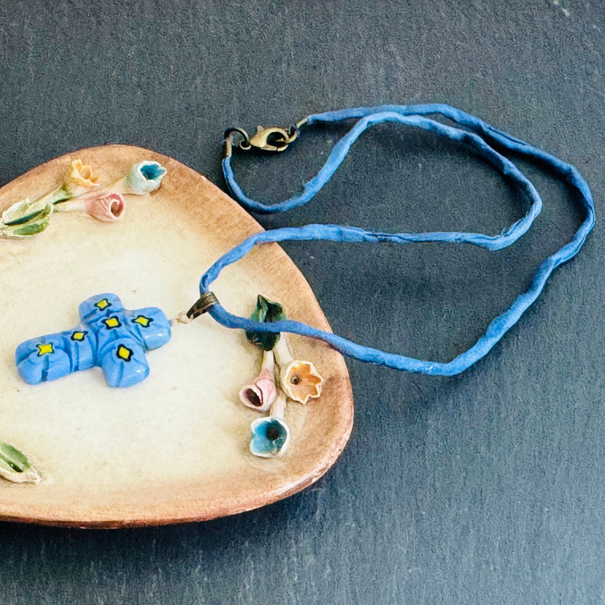 Light Blue and Yellow Murano Millefiori Glass Cross Pendant on Blue Silk