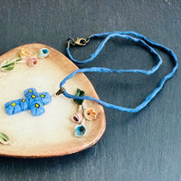Light Blue and Yellow Murano Millefiori Glass Cross Pendant on Blue Silk