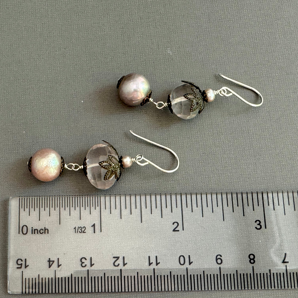 Rose quartz earrings measure two inches.