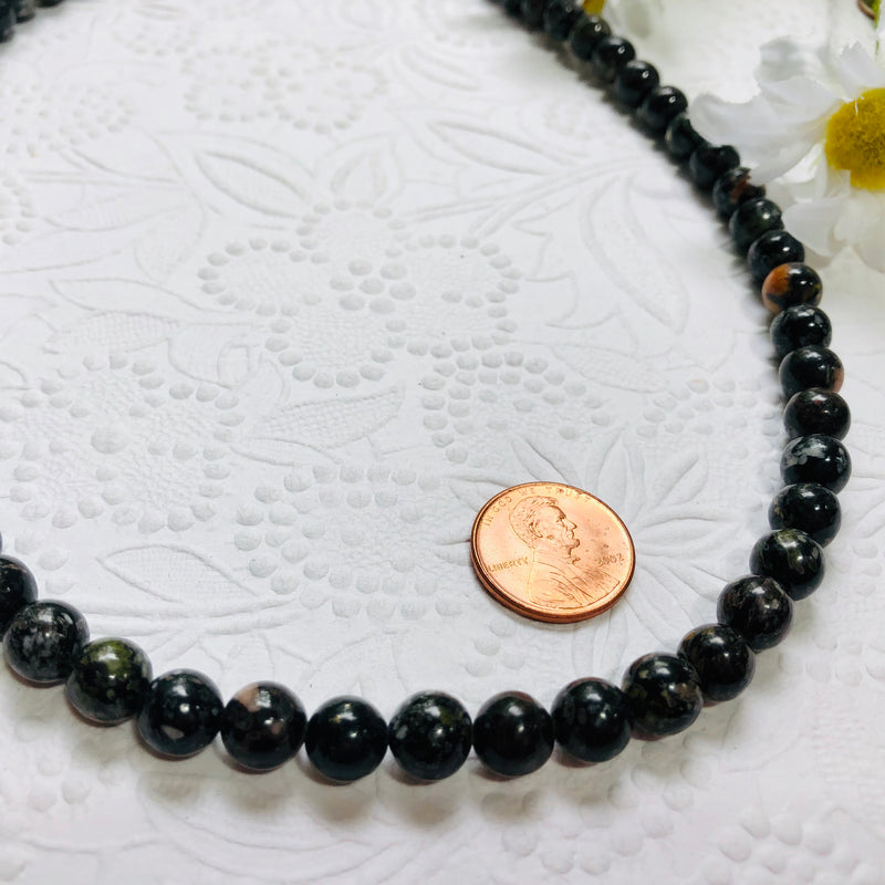 Flower Obsidian Gender Neutral Necklace in Sterling Silver