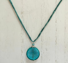 Load image into Gallery viewer, Murano Glass Teal Large Coin Shape on Silk Cord
